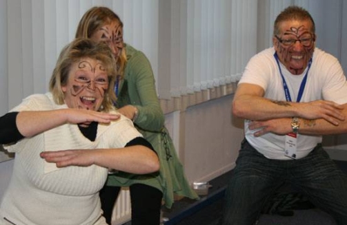 employees doing the haka as a guided activity'